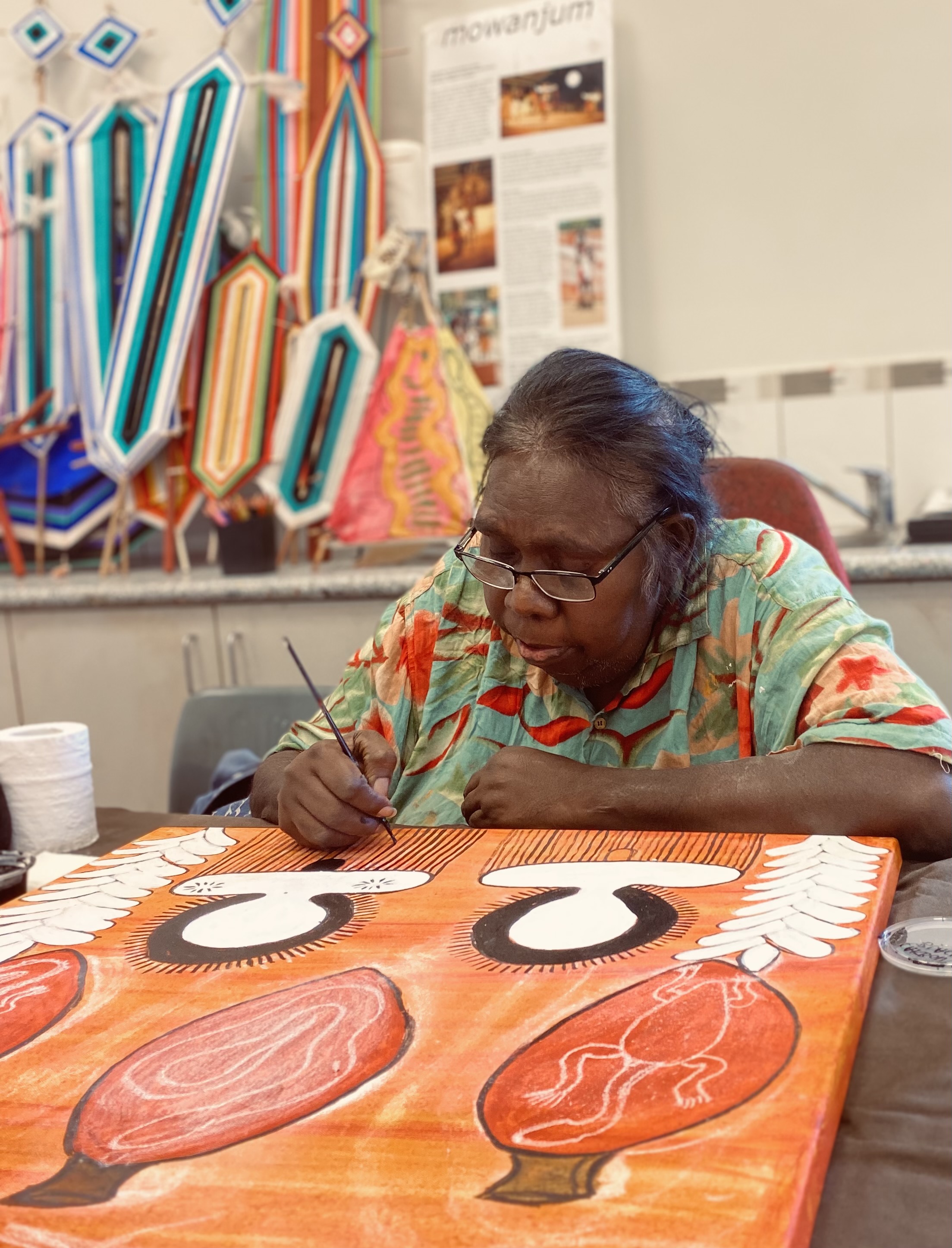 Donny Woolagoodja etching in the studio